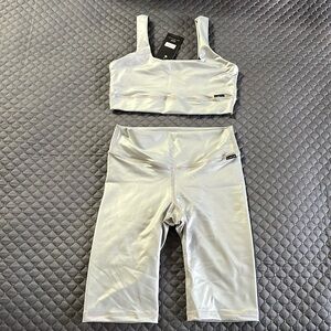 GYMTEX silver 2 piece New. Size M